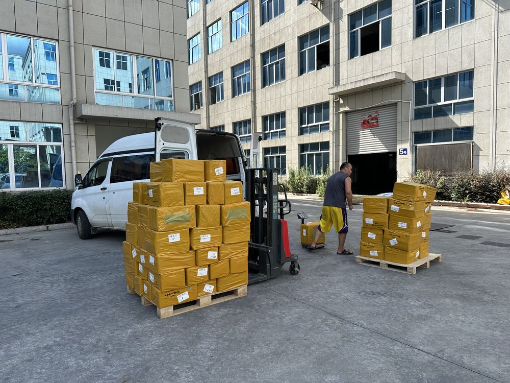 LOCACRYSTAL Pujiang factory loading bay with palletized cartons staged for export shipment