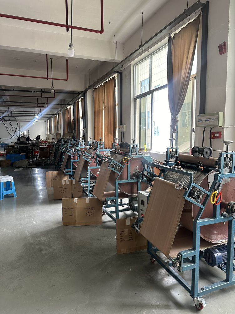 LOCACRYSTAL PVC Strip extrusion line at Pujiang factory — bronze profile in production