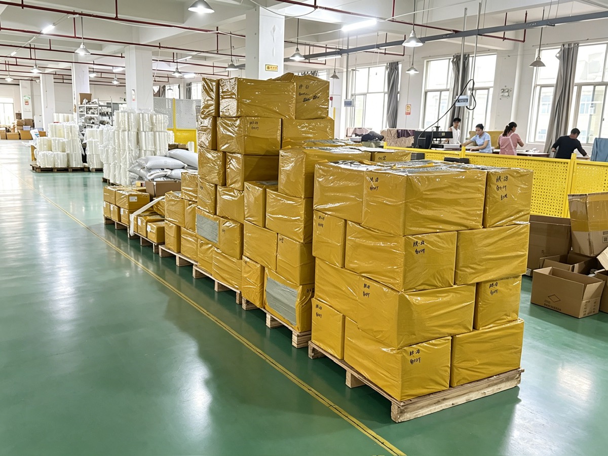 Outbound area of the Pujiang factory — palletized cartons packed for export