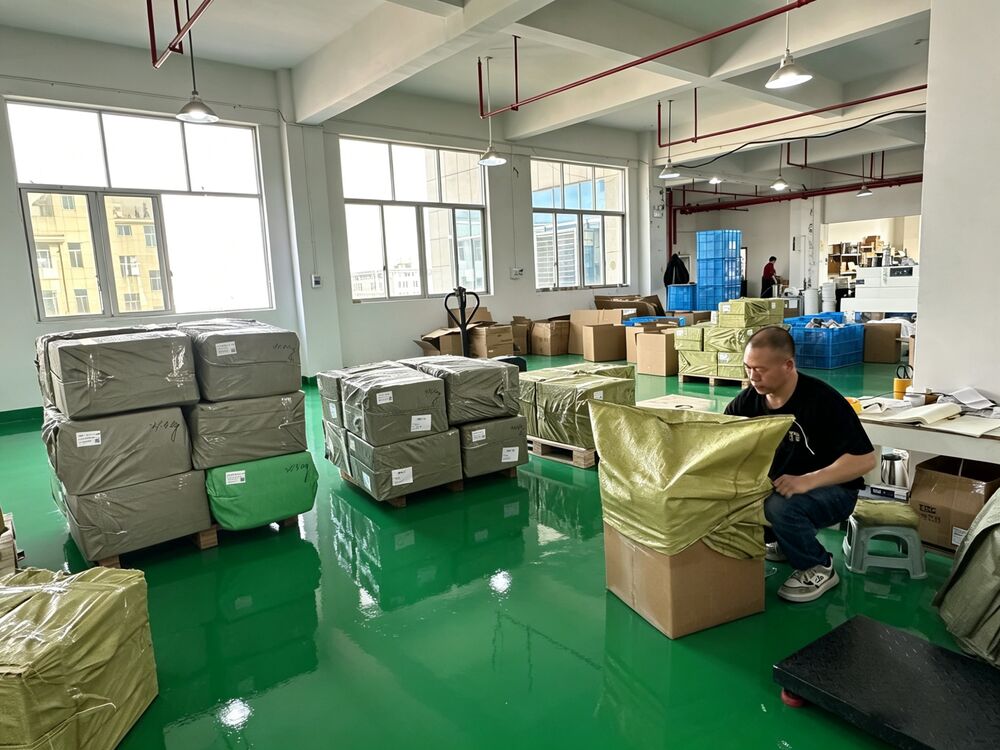 LOCACRYSTAL Pujiang packaging area with finished bangle decoration strips boxed and ready for shipment