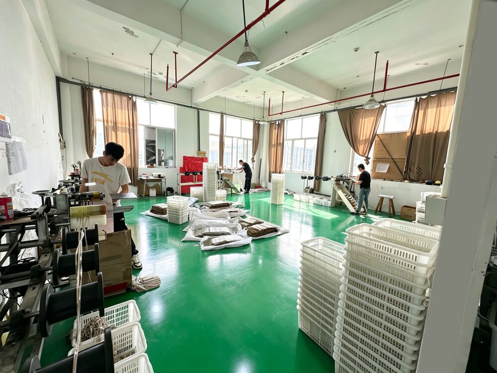 LOCACRYSTAL Pujiang factory wide view — multi-line rhinestone production floor where every term in this guide is run